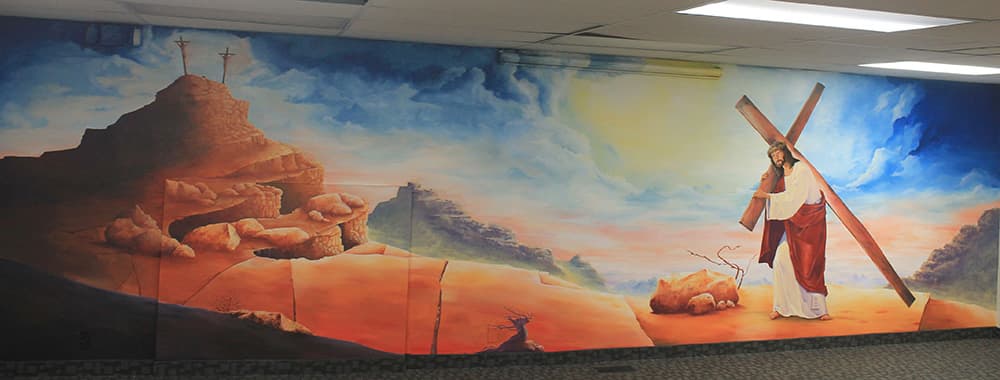 Scenic sanctuary mural printed across a church wall