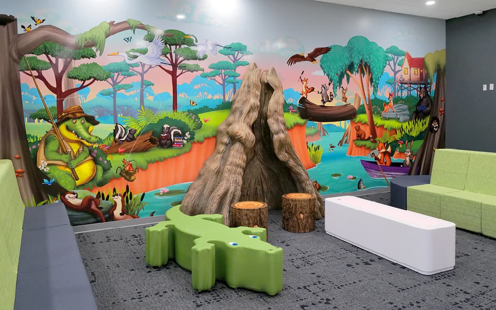 Everglades nature scene mural printed across a reception and waiting room wall