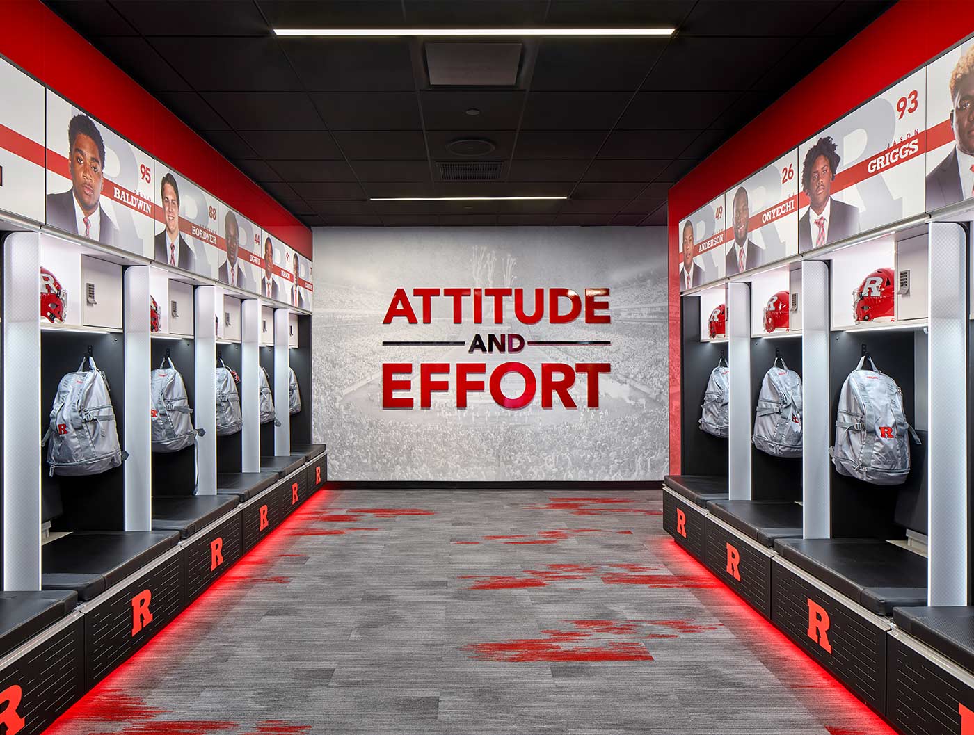 Motivational locker-room graphics printed wall-to-wall at a school